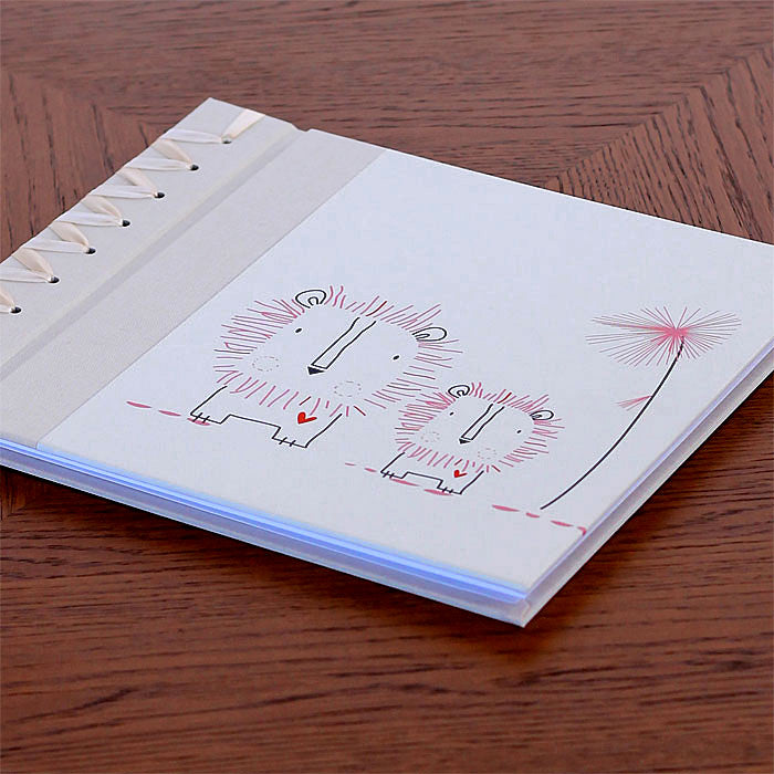 baby's first book - pink lion by rag & bone bindery