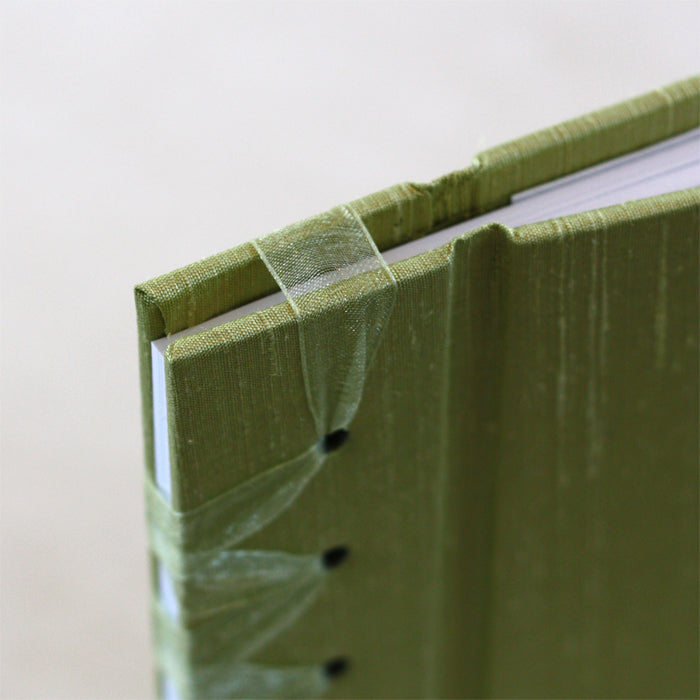 baby's first book - pear green by rag & bone bindery