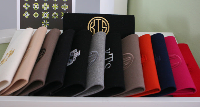 monogram felt clutch