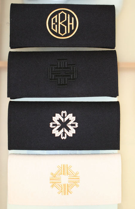 monogram felt clutch