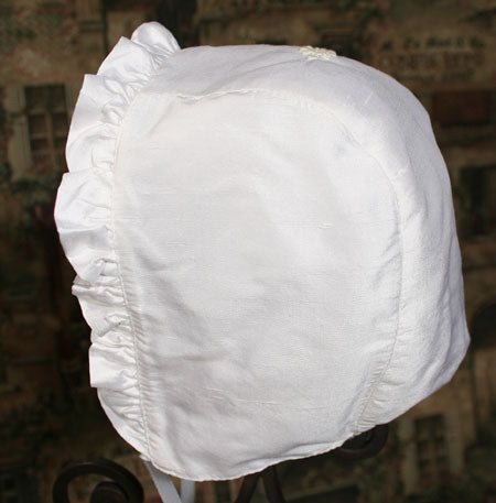 silk dupioni christening gown with smocked bodice