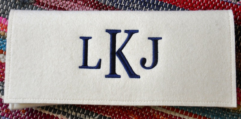 monogram felt clutch