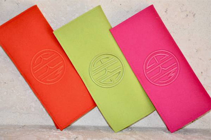 monogram felt clutch