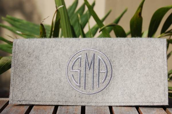 monogram felt clutch