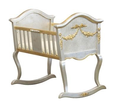 silver gold cradle with applique moulding and caning