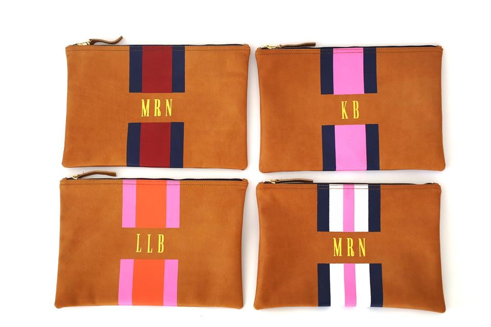 striped monogrammed leather flat clutch
