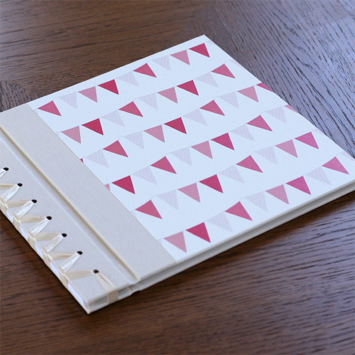 baby's first book - pink bunting by rag & bone bindery