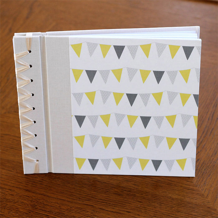 baby's first book - yellow bunting by rag & bone bindery
