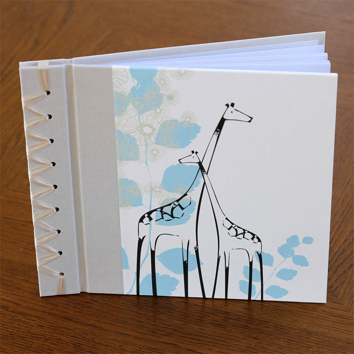 baby's first book - blue giraffe by rag & bone bindery
