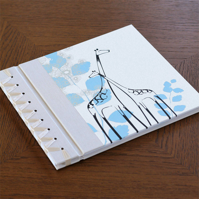 baby's first book - blue giraffe by rag & bone bindery