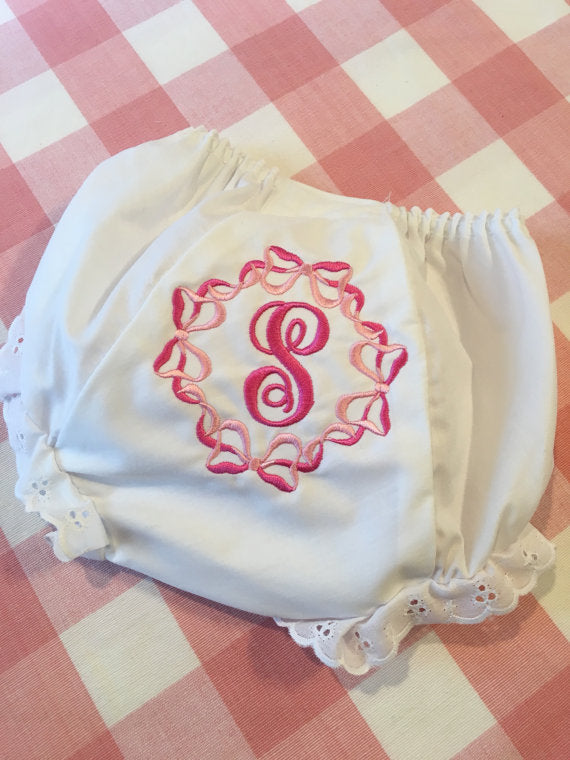 embroidered initial burp cloth with bows