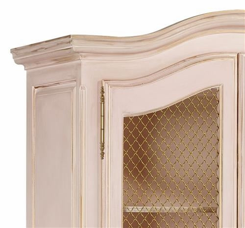 grand armoire with wire mesh doors