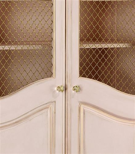 grand armoire with wire mesh doors