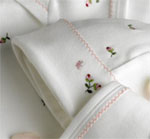 rosebuds deluxe embroidered layette set by gordonsbury