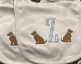 monogrammed puppy burp cloth and bib set