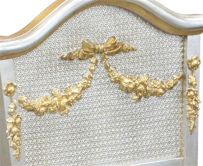 silver gold cradle with applique moulding and caning