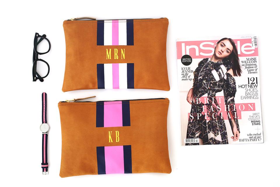 striped monogrammed leather flat clutch