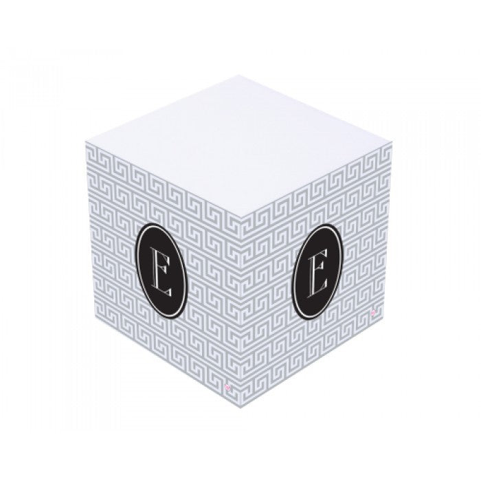 black and gray sticky note cube
