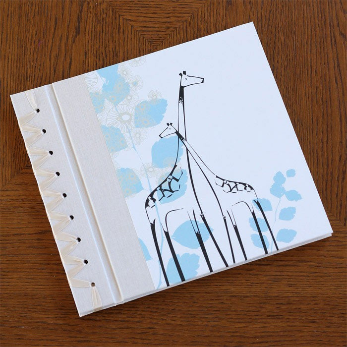 baby's first book - blue giraffe by rag & bone bindery